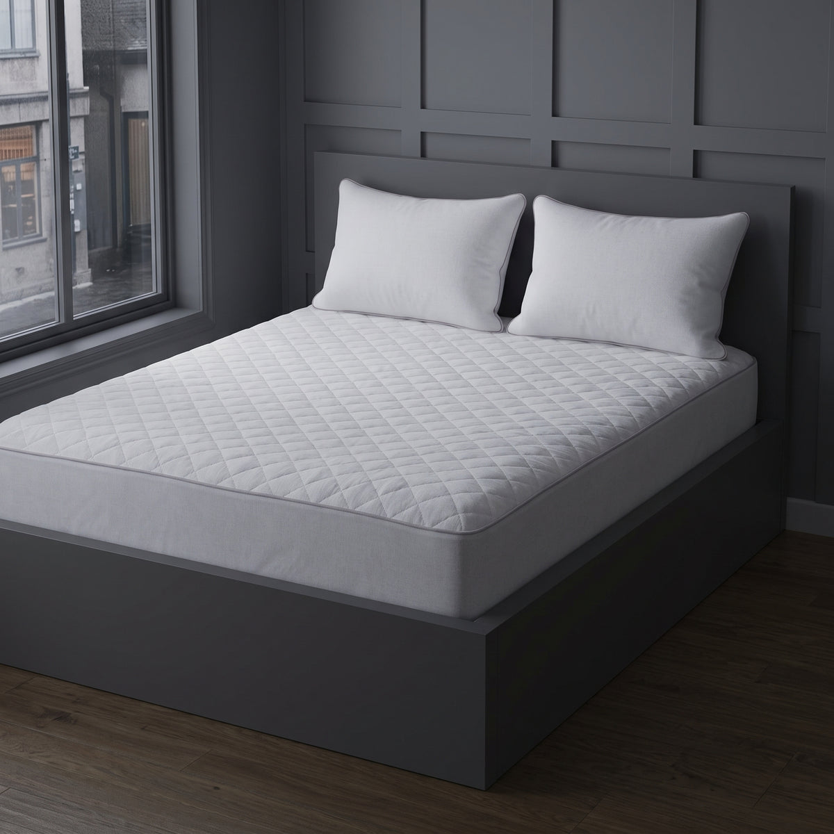 threadncloud mattress protector on a bed